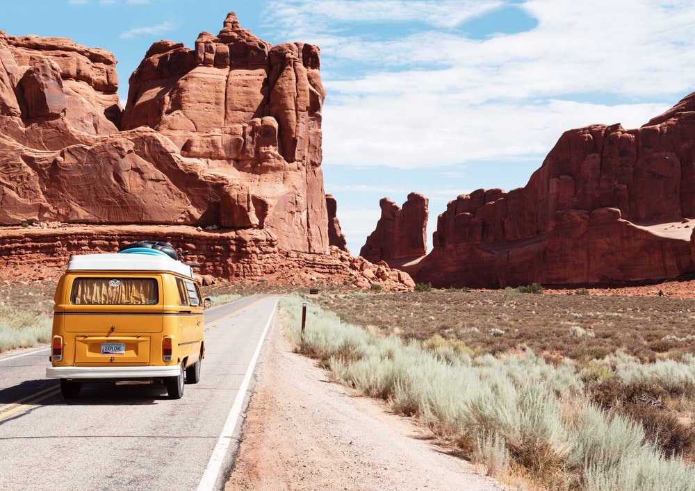 Start Now - campervan drives through the desert