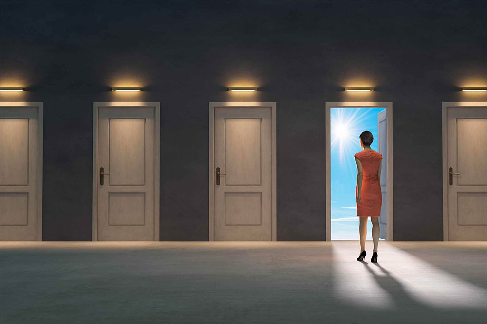 cartoon woman walking through door after making a decision with start now career course